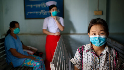 People wearing a mask in a hospital setting. Photo: Jonas Gratzer for the Global Fund