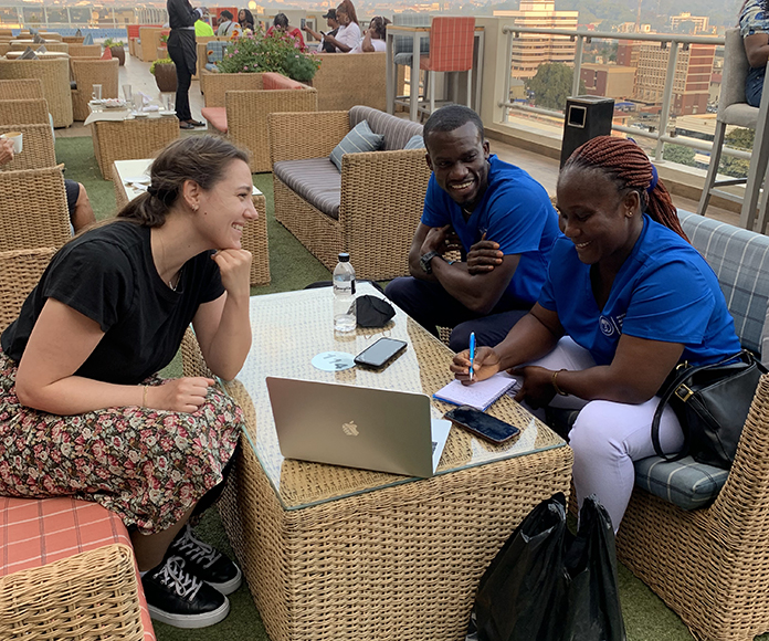 Anna Muller at a May 2022 cross-site meeting in Blantyre, Malawi, with GAIN midwife mentors Marshall Sackey and Annie Weah