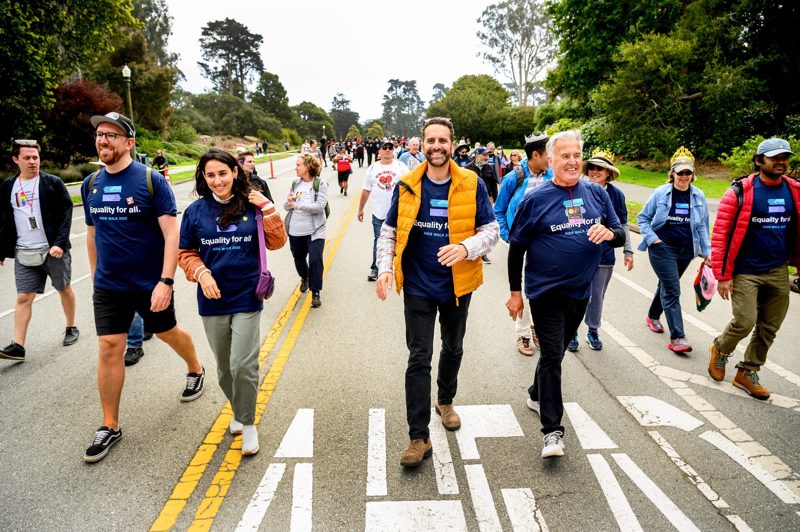 UCSF Global Health Sciences staffers take part in AIDS Walk on Sunday, July 17, 2022, in San Francisco. From right to left are IGHS communications coordinator Robert Mansfield, IGSH director of strategy Jeremy Alberga, Sima Maderi, and curriculum planner Graham Hinchcliffe.