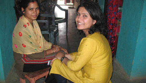 Interviewer (on right) interviewing a newly married woman for a 2-year longitudinal study conducted in Nepal. The longitudinal study laid the groundwork for the pilot study, which led to the current intervention.