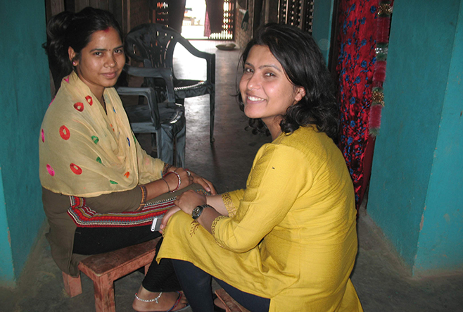 Interviewer (on right) interviewing a newly married woman for a 2-year longitudinal study conducted in Nepal. The longitudinal study laid the groundwork for the pilot study, which led to the current intervention.